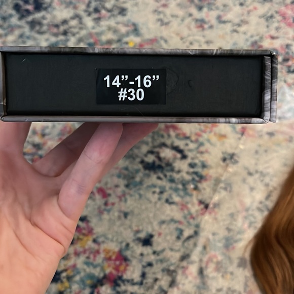 Halo hair extension-red hair. With hanger and storage bag, extra cord, and comb. - Picture 6 of 10